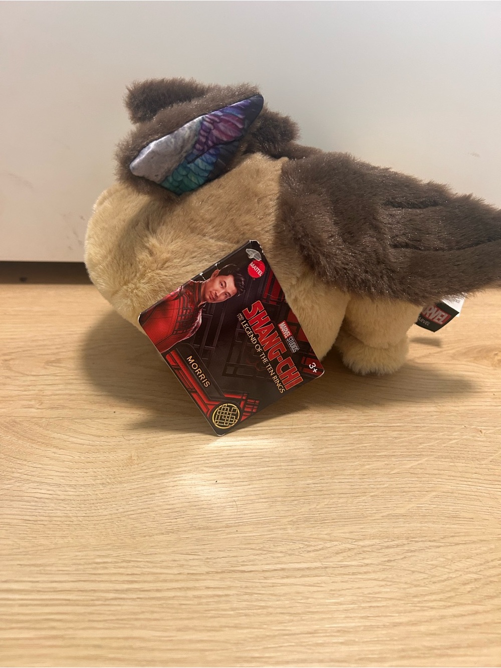 Marvel Tan and Brown Plush Morris Toy with Colorful Wing Detail